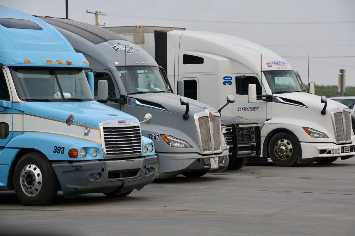 Licensed mover wrapping furniture for long distance transport in Gilbert, AZ