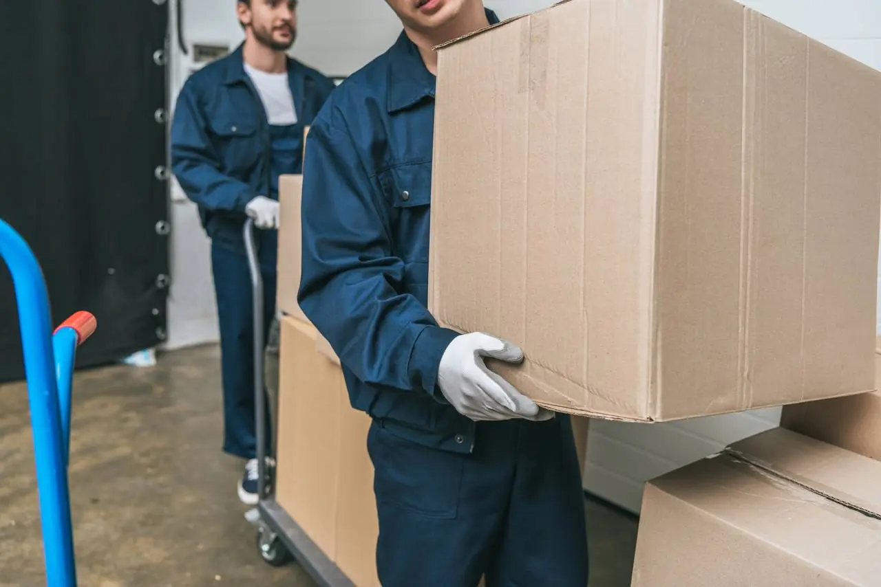 Moving crew loading belongings into moving truck in Ocala, FL