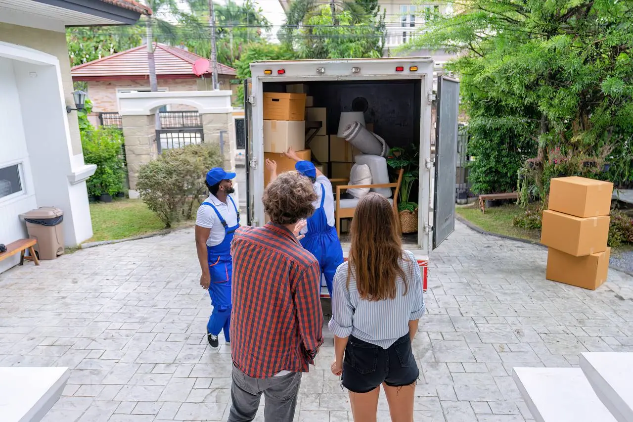 Professional mover stacking boxes inside moving truck in Hampton, VA