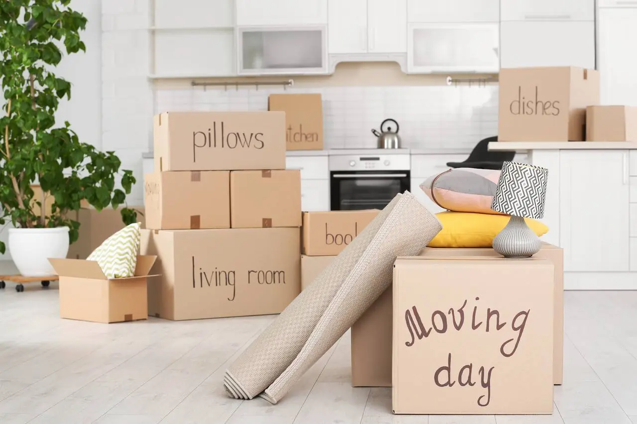 Professional mover wrapping furniture for long distance move in Fort Collins, CO